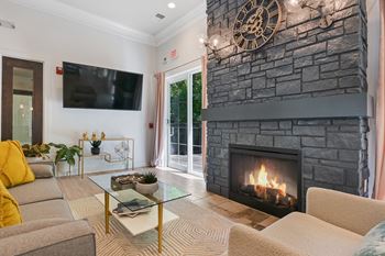 Clubroom with smart tv and fireplace